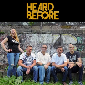 Foto der Band "Heard Before" vor einer Mauer